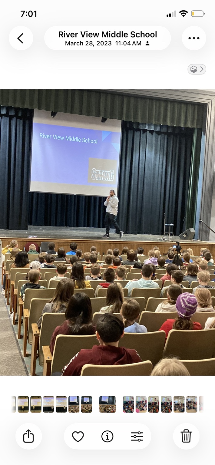 Alex Green speaking to students at River View Middle School